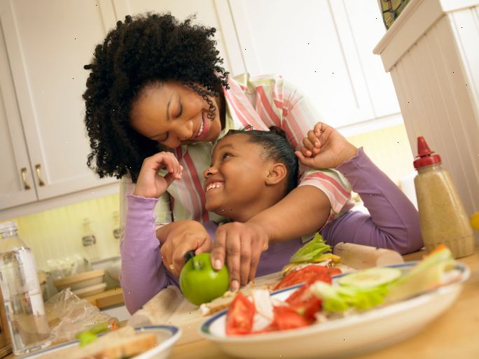 Kæmp barndommen fedme som en familie. Bestanden op på sunde fødevarer.